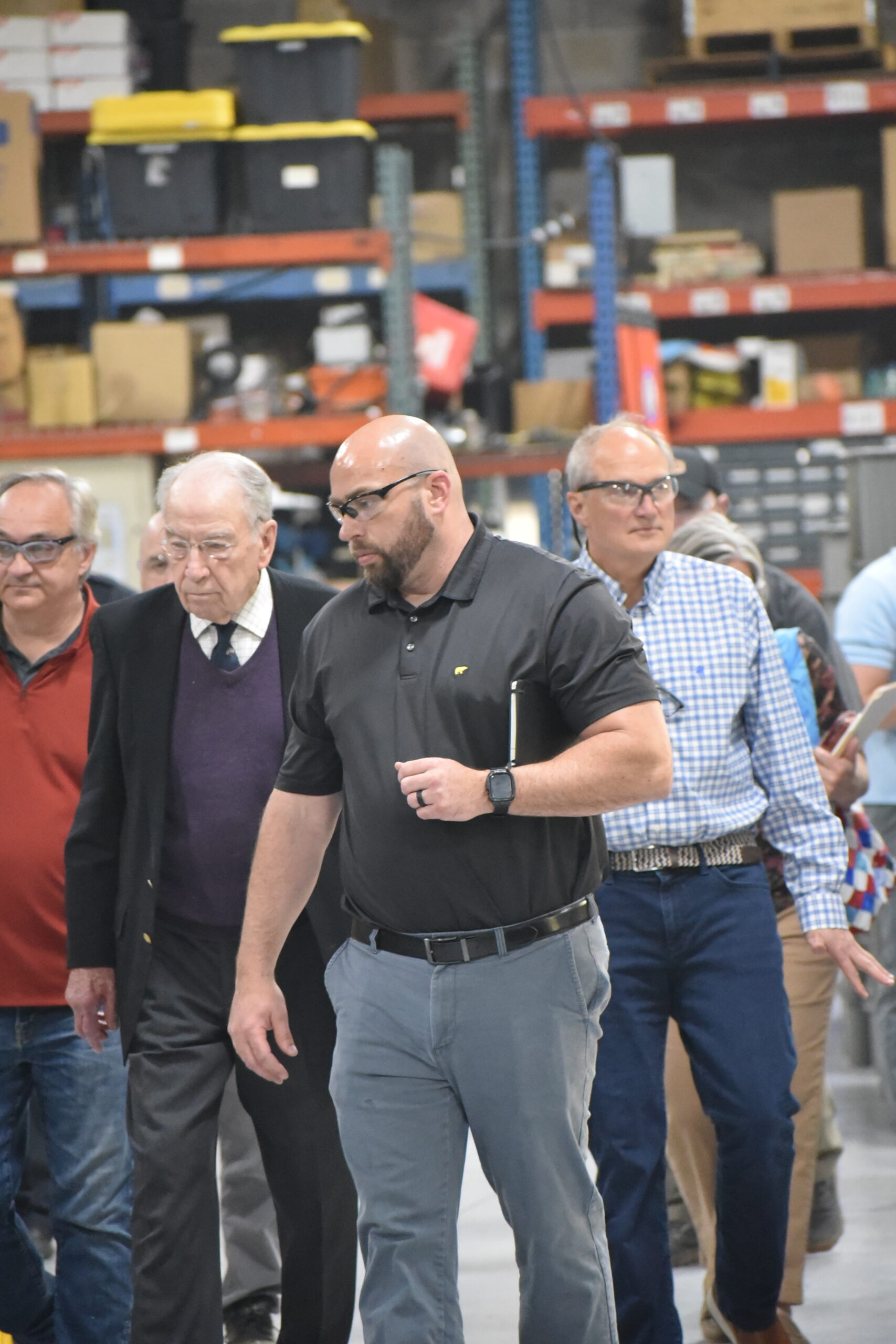 Senator Chuck Grassley tours LMT facility with LMT AT & LMT Defense founder Karl Lewis, plant manager, and COO.